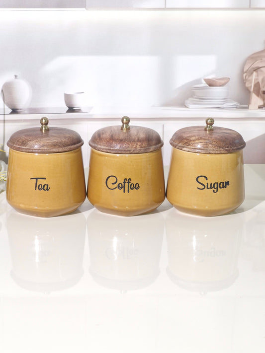 The Harvest Gold Ceramic Tea, Coffee, Sugar, and Salt Storage Canisters with Wooden Lids