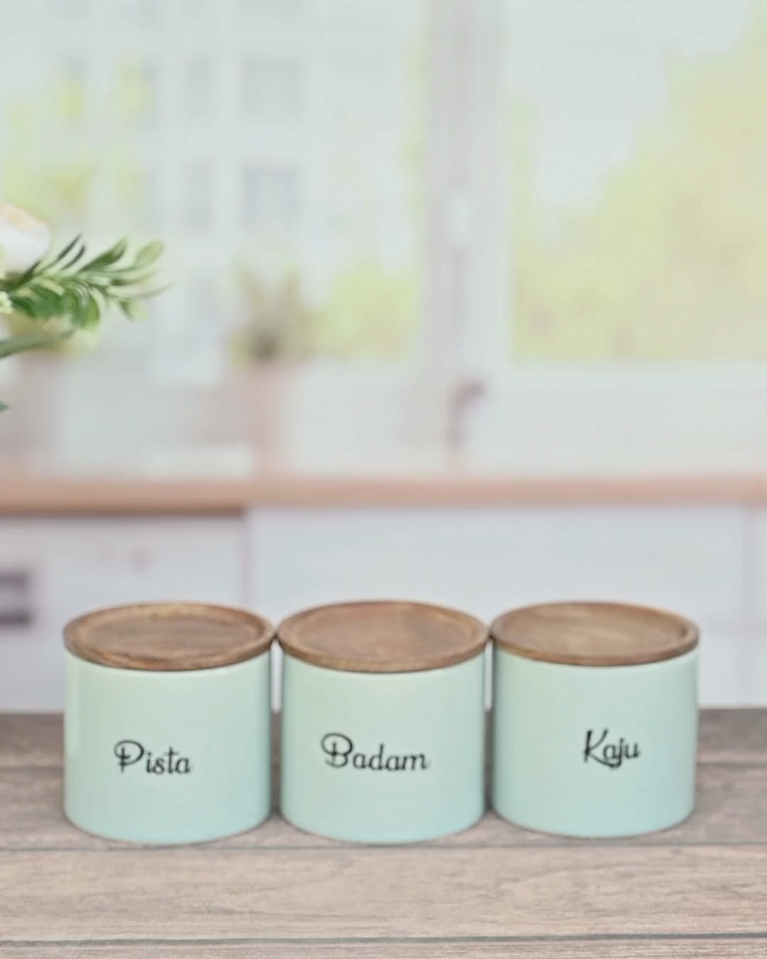 The Nut Keeper Ceramic Canister Set with Wooden Lids